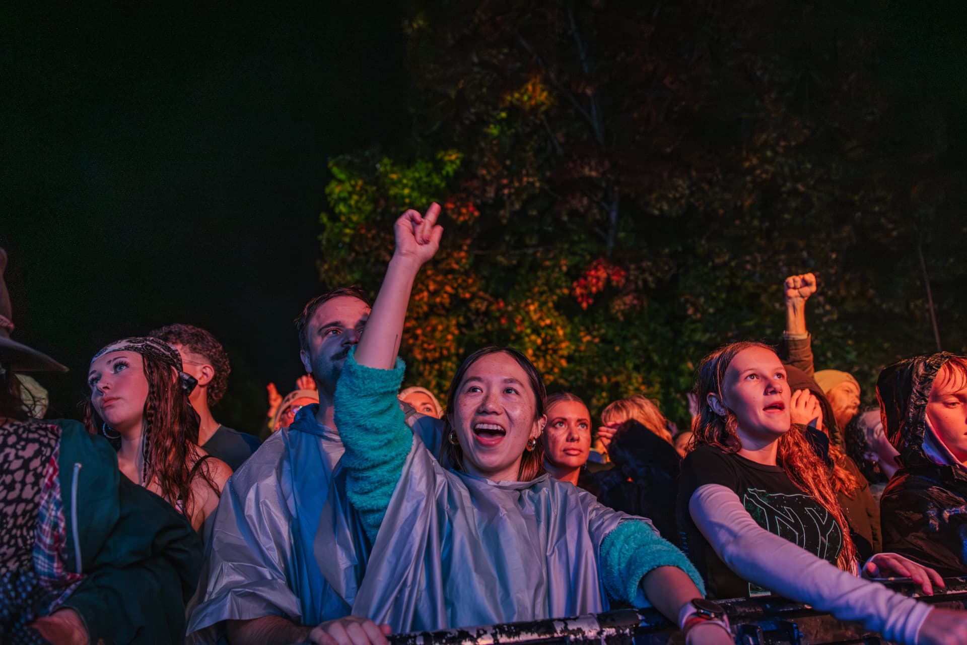 Fans cheering at the front barrier